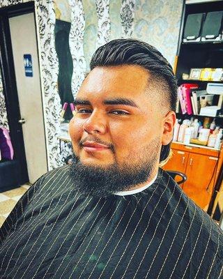 Taper fade with a slick back mullet