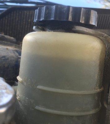 Over-filled Power Steering fluid