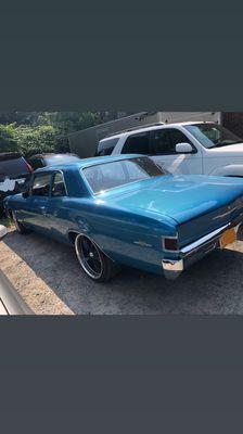 Light Blue 1967 Chevy CHEVELLE getting a new exhaust put in