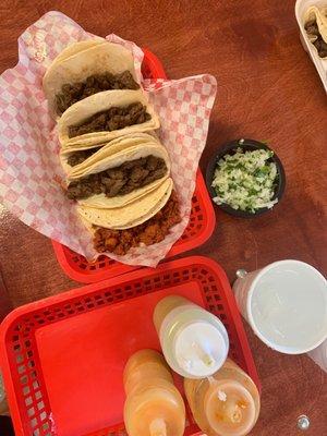 5 tacos $10. Tortillas are made in house.