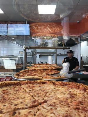 Our pizza! It's been a hit so far, so if you haven't had a chance to stop by and grab a slice - come! We can have pies ready in 10 minutes.