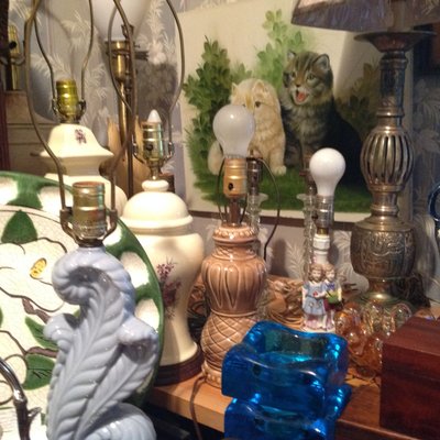 Assorted lamps, porcelain , brass, pottery , original art and  Hand blown glassware .....