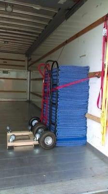 Neatly stacked furniture pads.