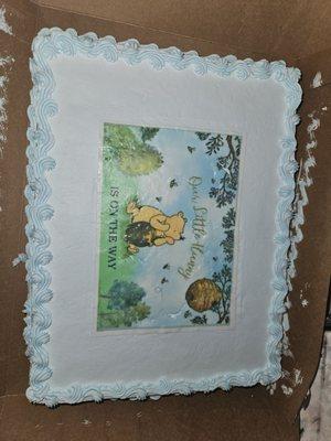 This is the cake I picked up. The printed edible paper did not cover the entire cake, and it had cracks in it.