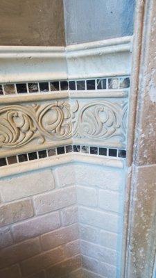 This is the kind of wall decoration in my bathroom. It is stone and tile