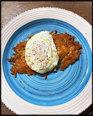 Egg over easy and hash brown.