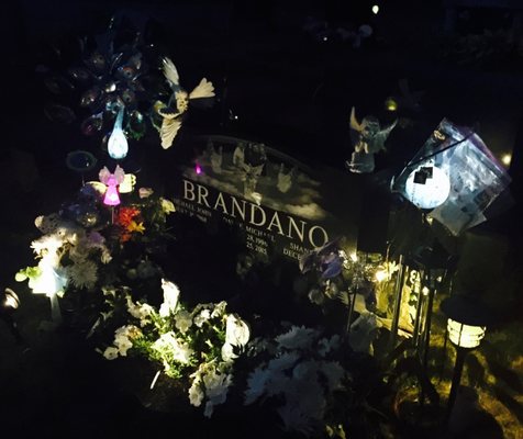 Night time in the cemetery...beautiful family memorial lit up..