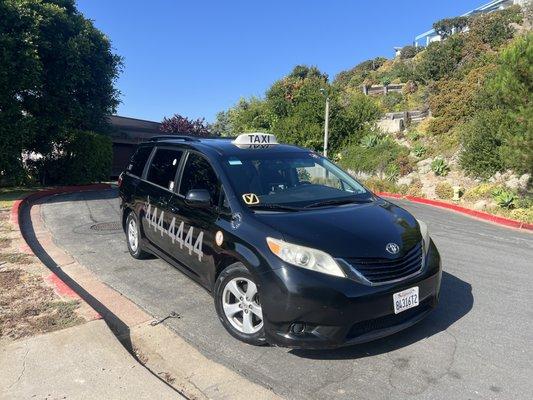 Yellow Taxi Cab Minivan near Seal Beach CA