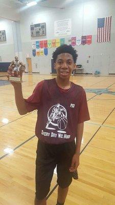 Another young PSA player celebrating his best layup contest win