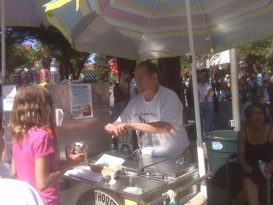 Ralph satisfying another customer at the Rose Parade, 2009