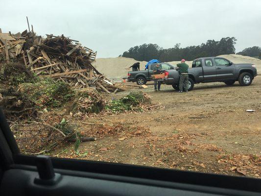 Yard waste, wood recycle area.  Pay and drive up.