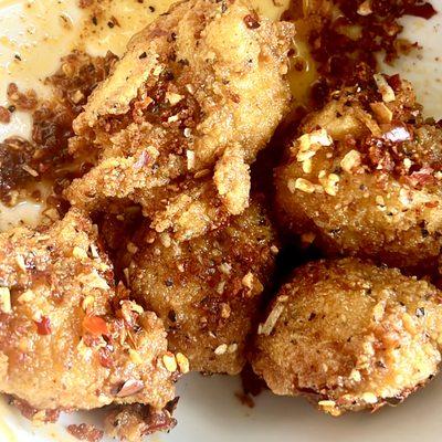 Our crispy seasoned nugs tossed in our Korean hot pepper oil and sprinkled with our Nashville Hot seasoning