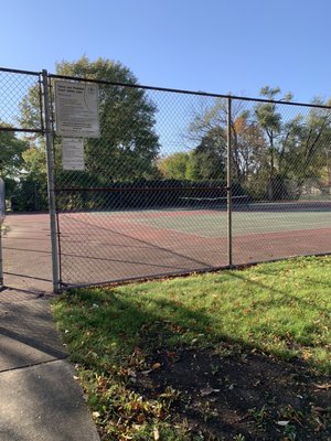 Tennis/pickle ball. Missing a net.