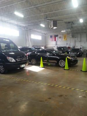 Our garage with onsite car wash and detail crew. We take pride in keeping our vehicles in showroom condition!