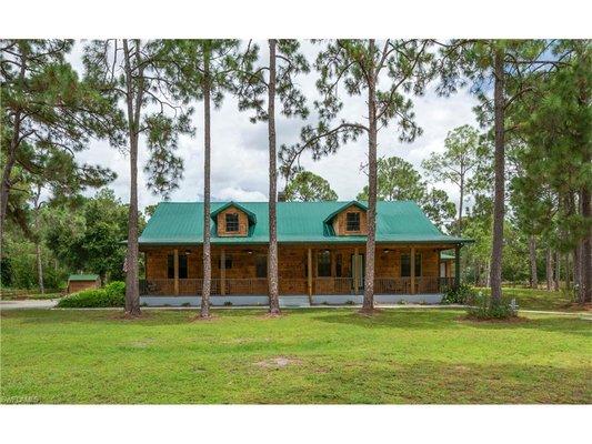 Beautiful log cabin on 2.3 acres.  SOLD!