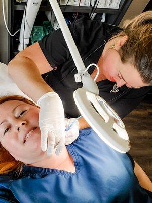 Prickly Pear babe Jennifer is all smiles while we eradicate a stray hair on her chin