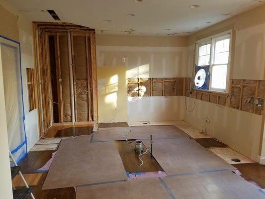 Bare wall before new kitchen cabinets install