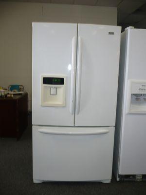 French door style Refrigerator 26 cu ft capacity Beautiful and spacious Call for more details!!