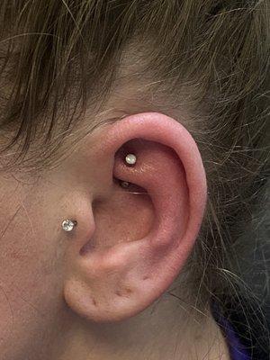 Rook piercing with white opal