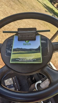 Golf cart and score card