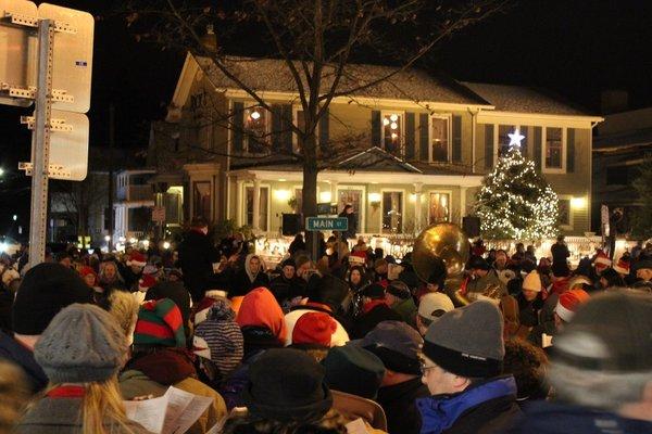 Annual Carolcade Event. Every December 1,000's gather on Main Street to raise a glass and join in festive song and celebration