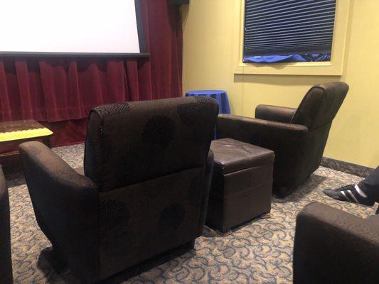 In the small upstairs cinema there is a 12 seat living room sears room. Awesome