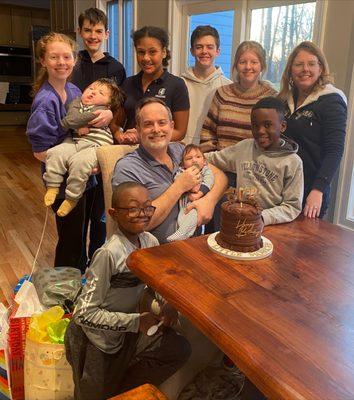 Spence-Chapin adoptive family celebrating first birthday of Judah - adopted through Spence-Chapin's Special Needs Adoption Program