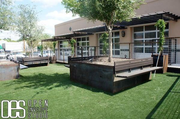 Austin Pets Alive:  steel planters for large oaks,smaller planters, steel trellis over garage bays, a surrounding fence