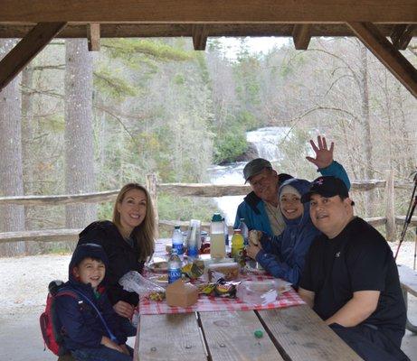 Having picnic at waterfall