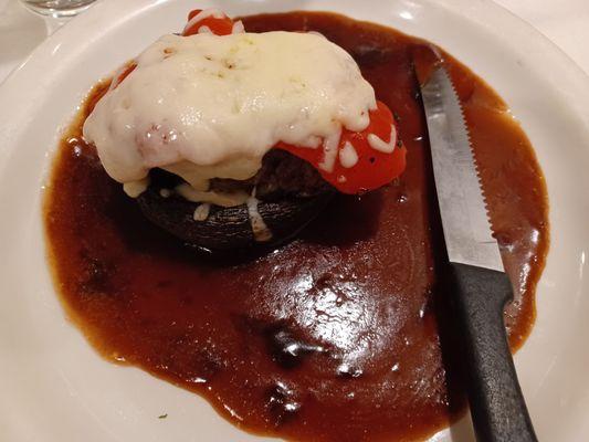 Filet Napoleon.  Portobello mushroom stuffed with 6oz filet, mozzarella, and roasted red pepper.