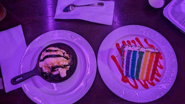 Rainbow cake and fudge brownie with vanilla ice cream.