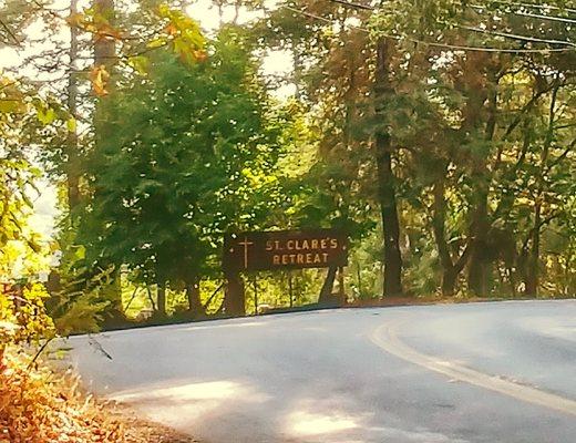 Look for this St. Clare's Retreat sign at the entrance which marks the turnoff from the main road.