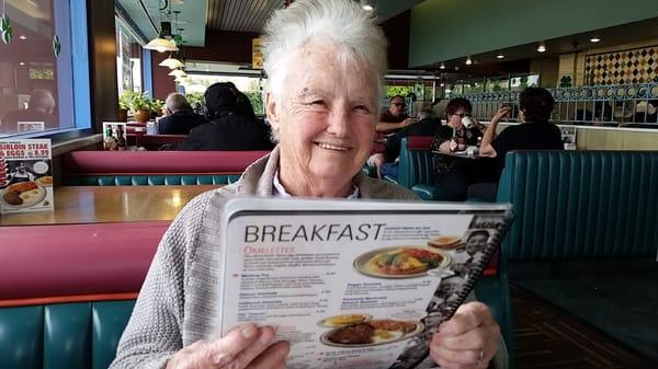 First time mom has been able to read a restaurant menu in ages...look at that smile