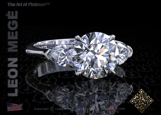 Three stone engagement ring