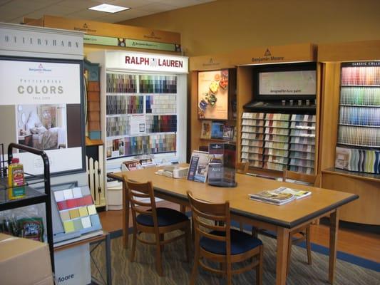 Inside our paint store is a big well lit decision making area.