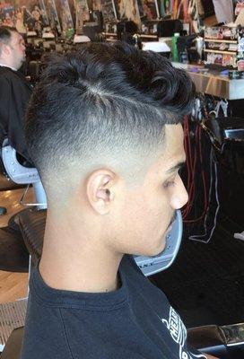 Mid bold fade, over comb , edge up,straight razor