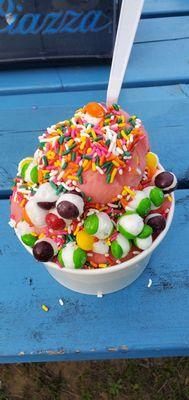 Watermelon sorbet topped with freeze dried skittles