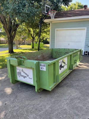 Dumpster in our driveway at delivery