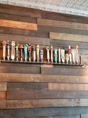 Decorative beer taps on the wall.