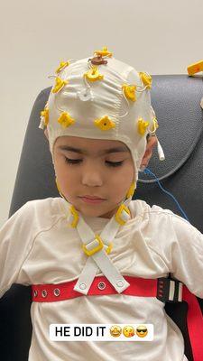 My son doing his first EEG