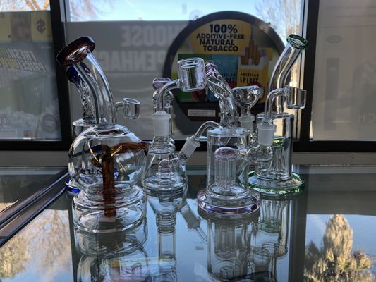 Bongs and dab rigs. Get $10.00 off by showing this pic