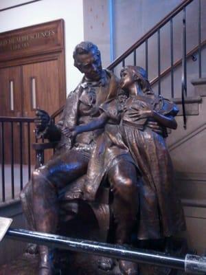 Sculpture of Thomas Hopkins Gallaudet and a student by the north entrance.