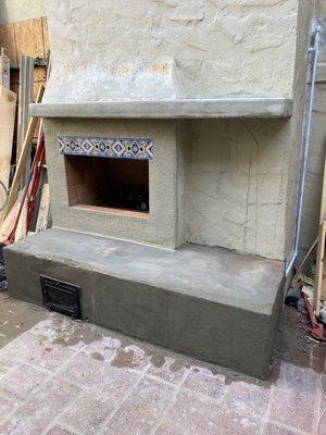 Construction: Mantel & Beach being created and period tile incorporated into the outdoor Fireplace