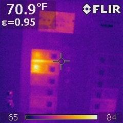 Infrared image showing an overheating circuit breaker..