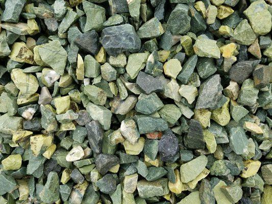 Green rock 3/4 sold for $100 per cubic yard. One cubic yard covers 160 square feet at 2" depth.