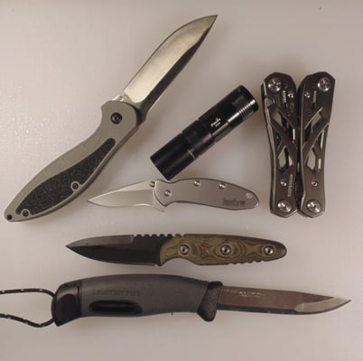 Knives and multitools for sale.