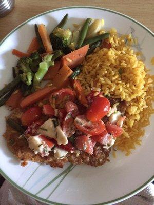 Chicken Milanese w/ bruschetta, rice& veggies