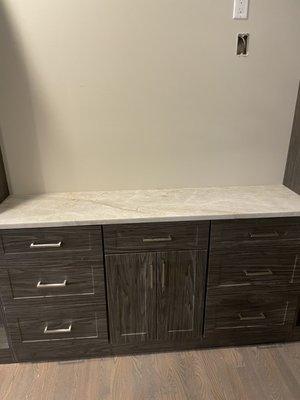 Taj Mahal quartzite, leather finish in closet