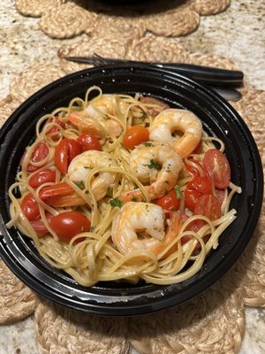 Shrimp scampi over linguini