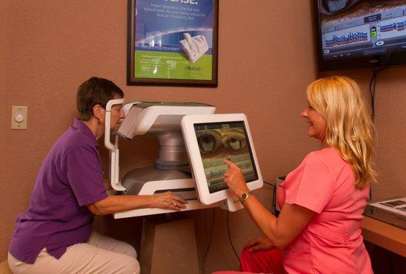 Staff examining a patient